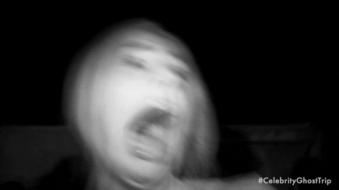 Woman screaming and running away from someone