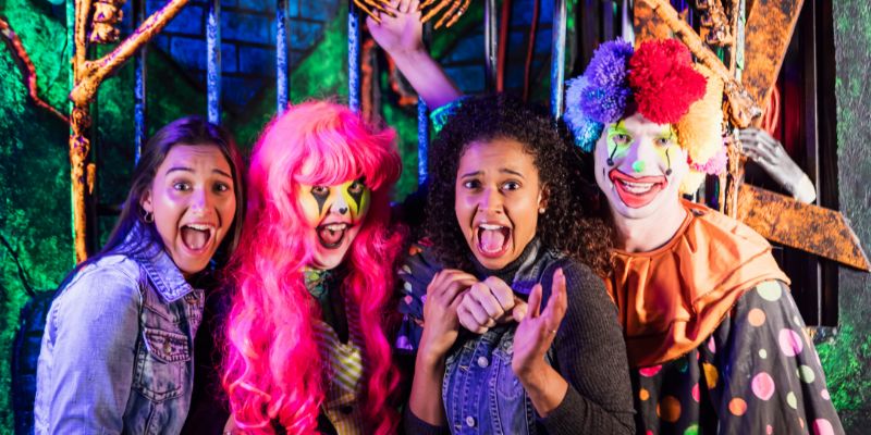 group of scared guests at a haunted house