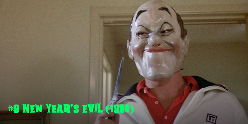 creepy murderer holding a knife and wearing a mask