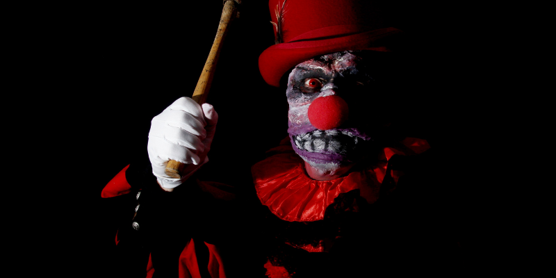 murdurous-red-clown-weilding-axe