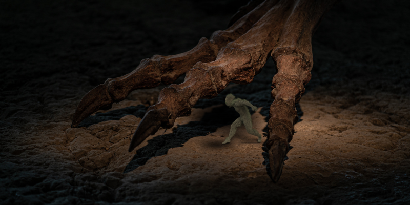 Gigantic creature's foot lurching towards a small creature running away
